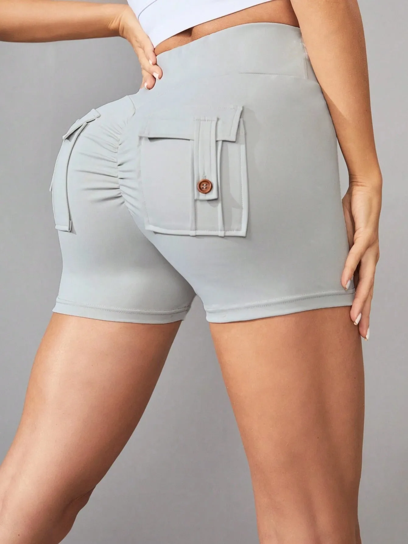 Nia Wide-waistband Flap Pockets Gym Shorts