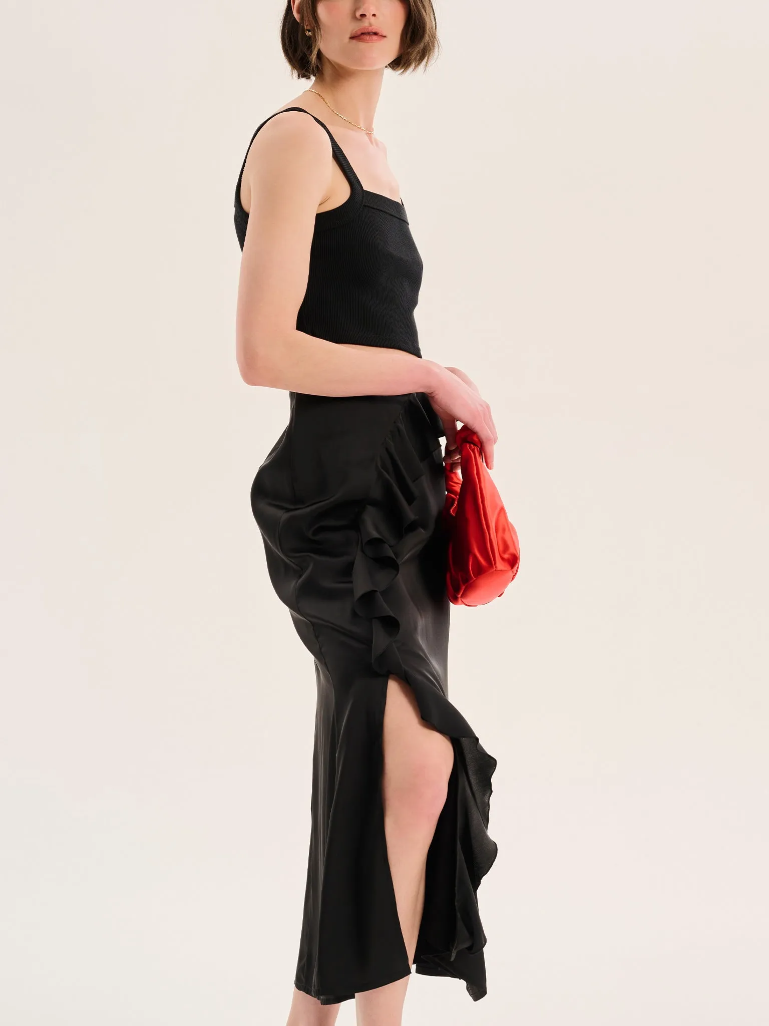 Udita Ruffle Detail Midi Satin Skirt in Black